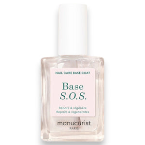 A clear glass bottle of MANUCURIST - S.O.S. NAIL STRENGTHENER BASE COAT by MANUCURIST INC, featuring a white cap and a label that reads “Répare & régénère – Repairs & regenerates.” This nourishing base coat is specially formulated to strengthen and restore damaged nails.