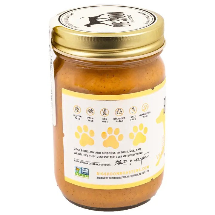 BIG SPOON ROASTERS WAG BUTTER VANILLA TATER is a handmade nut and peanut butter for dogs, with a gold lid and white label with yellow accents and a dog silhouette—an irresistible treat from BIG SPOON ROASTERS.