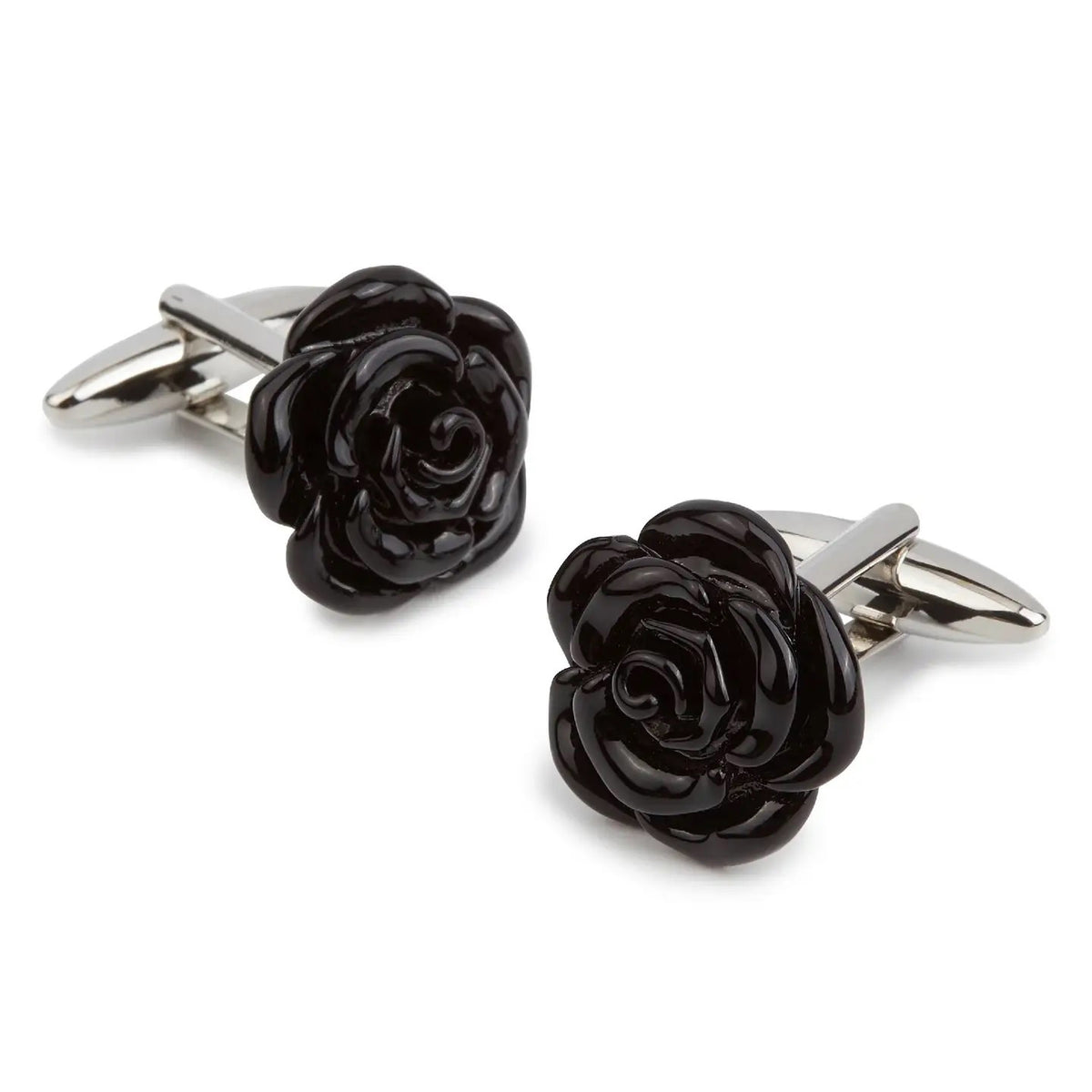 STOLEN RICHES - BLACK ROSE CUFFLINKS by STOLEN RICHES feature black rose-shaped designs with silver-toned hardware, displayed on a white background—a stylish men’s accessory and a perfect gift for him.