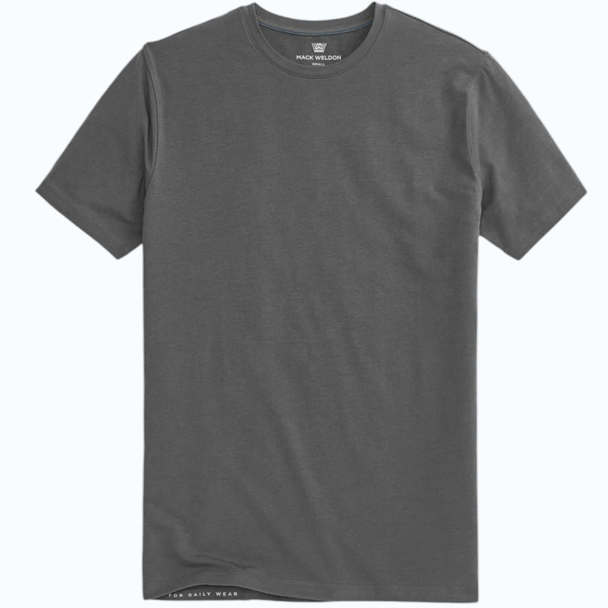 A man with short dark hair and a beard wears a MACK WELDON SILVER CREW NECK T-SHIRT and a black watch, standing against a light gray background with a neutral expression.