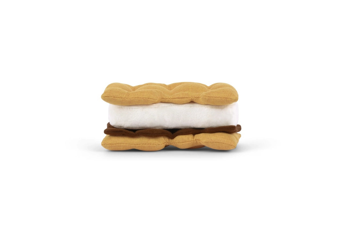 Sure! Here’s a rewritten sentence using your product data: Shaped like a s’more with light brown “graham crackers,” a white “marshmallow,” and a dark brown “chocolate” layer, this durable fabric dog toy—the CAMP CORBIN - GIMME S’MORE from PLAY PET LIFESTYLES—makes the perfect playtime or snuggle companion for pups.