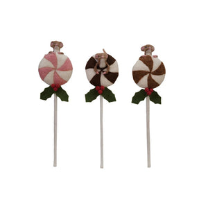 The CREATIVE COOP HANDMADE FELT LOLLIPOP WITH MOUSE features three wool felt lollipops topped with small felt mice, red holly berries, and green leaves in brown/white, tan/white, and pink/white swirls on a light background.