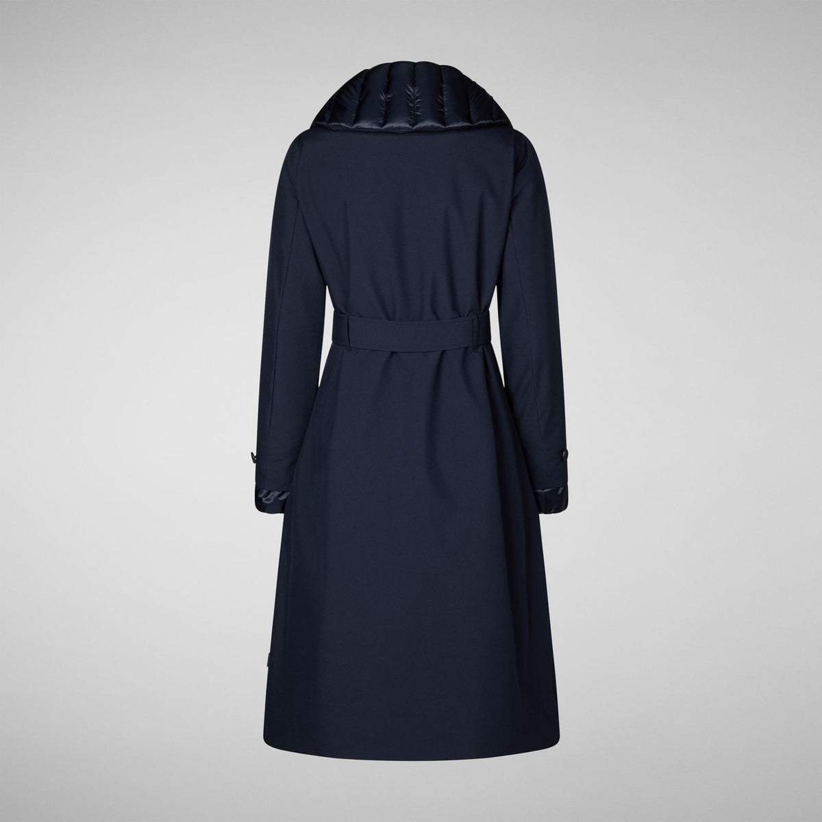 The SAVE THE DUCK GABRIELLE LONG SLEEVE COAT, a navy blue, water-resistant trench with a belted waist, matching buttons, and quilted hood and cuffs from SAVE THE DUCK, is shown on a plain light gray background.