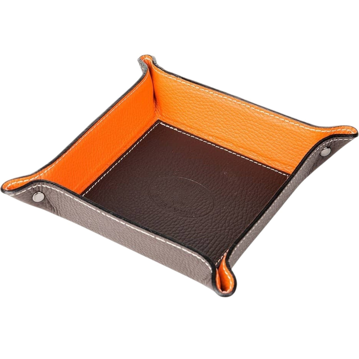LE BORSETTE square hammered leather valet tray in chocolate, handmade in Italy, with a dark brown exterior and bright orange interior, held together by silver-toned snap buttons at the corners.