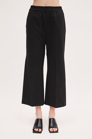 The MEIMEIJ - PULL ON STRAIGHT LEG PANT from MEIMEIJ features a solid green background that evokes the breezy vibe of summer, offering a refreshing canvas with no other visible elements or patterns.