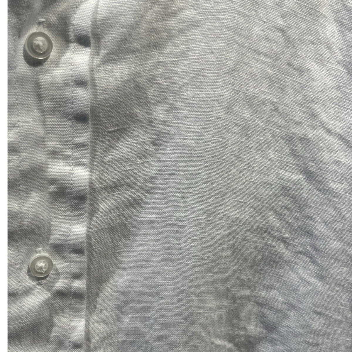 The FRANK & EILEEN Finbar Men's Button Up Shirt in White Washed Linen is shown with casually rolled long sleeves and a relaxed, slightly wrinkled look against a plain white background.