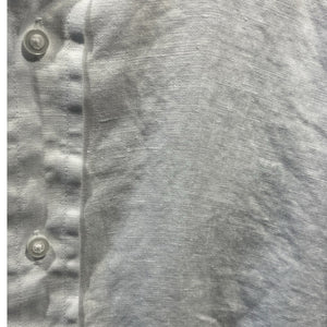 The FRANK & EILEEN Finbar Men's Button Up Shirt in White Washed Linen is shown with casually rolled long sleeves and a relaxed, slightly wrinkled look against a plain white background.
