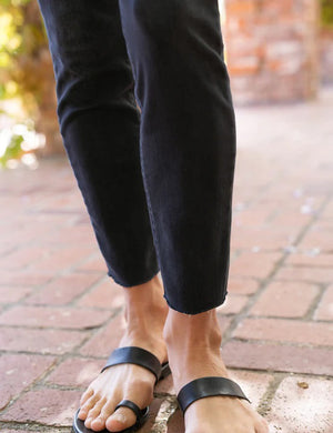 A pair of the FRANK & EILEEN Sligo Skinny Jeans in the 1991 Wash is laid flat against a plain white background. These jeans feature a high-rise contour waistband, five pockets, and a slightly faded design on the thighs, offering a stylish and modern look with Italian Performance Denim for added comfort.