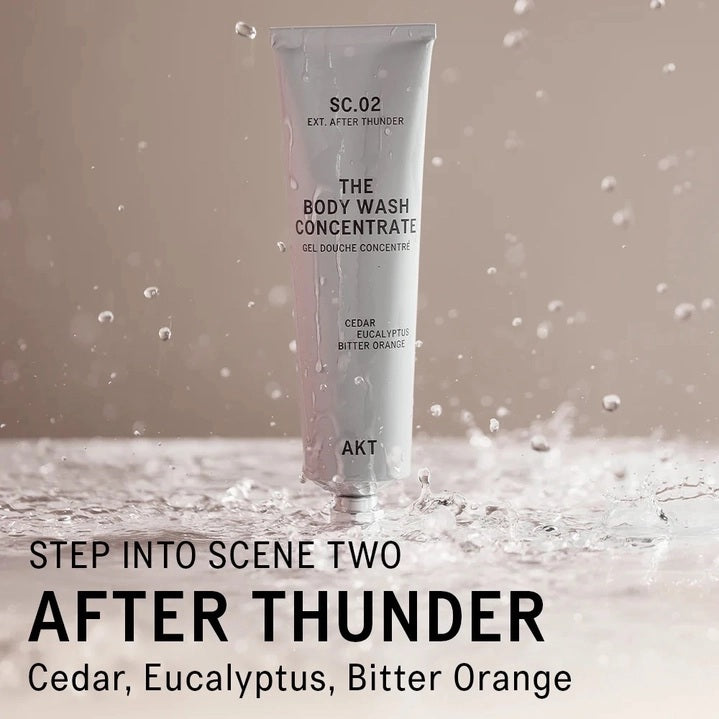 A partially squeezed purple tube labeled AKT London, featuring “BODY WASH CONCENTRATE AFTER THUNDER,” highlights long-lasting use—one tube lasts up to 3 months. Packaged in 100% recyclable aluminum with zero plastic, this vegan, plastic-free body wash offers a powerful and concentrated 3x formula with no added water.