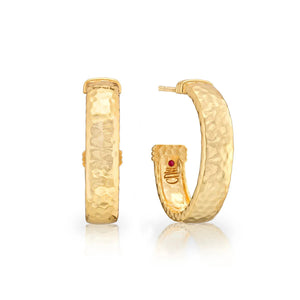 The CAPUCINE DE WULF Cleopatra Classic Medium Hoop Earrings feature a hammered gold finish, textured surface, and a subtle red dot on the inner edge. Shown from front and side views. Anti-tarnish coating ensures lasting shine.