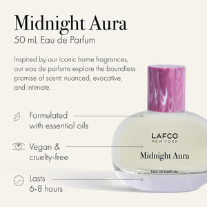 A clear, oval-shaped bottle of LAFCO - FINE FRAGRANCE, MIDNIGHT AURA 50ML, labeled with the LAFCO brand, crafted as a vegan perfume with essential oils and topped with a light pink marbled cap, displayed on a white background.
