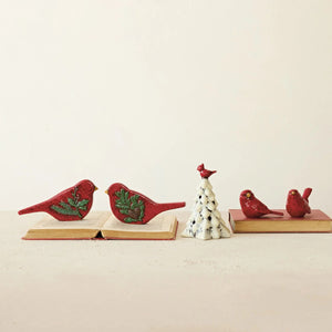 A Creative Coop HAND PAINTED TREE WITH LED LIGHT, featuring a white ceramic design with brown accents and a red cardinal perched on top.