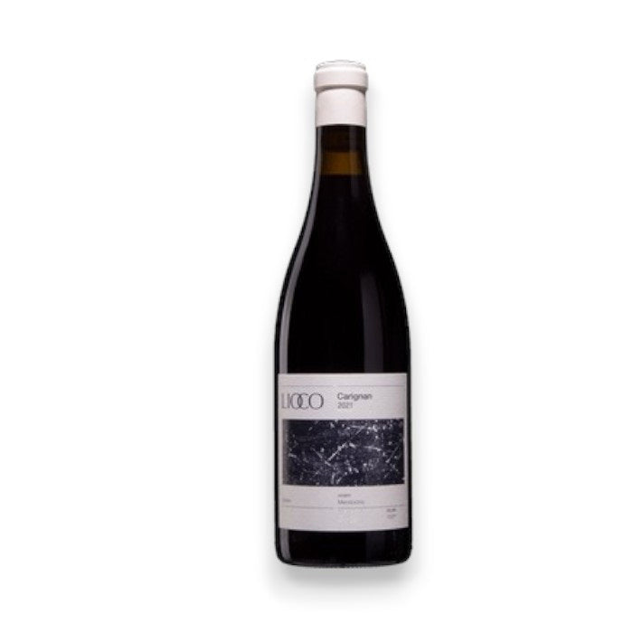 A bottle of LIOCO 'SATIVA' Carignan 2021, from WINE: PROOF, features a dark purple label with abstract artwork and minimalist design, complemented by a plain white cap.