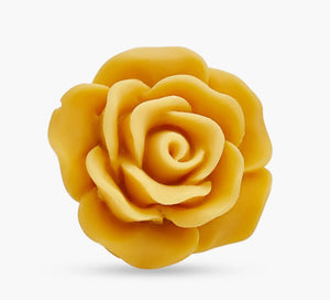 The CLIFTON WILSON RESIN LAPEL FLOWER PIN features vibrant orange and yellow petals in a rose-like design, closely resembling a wedding boutonniere, and is photographed against a plain white background.