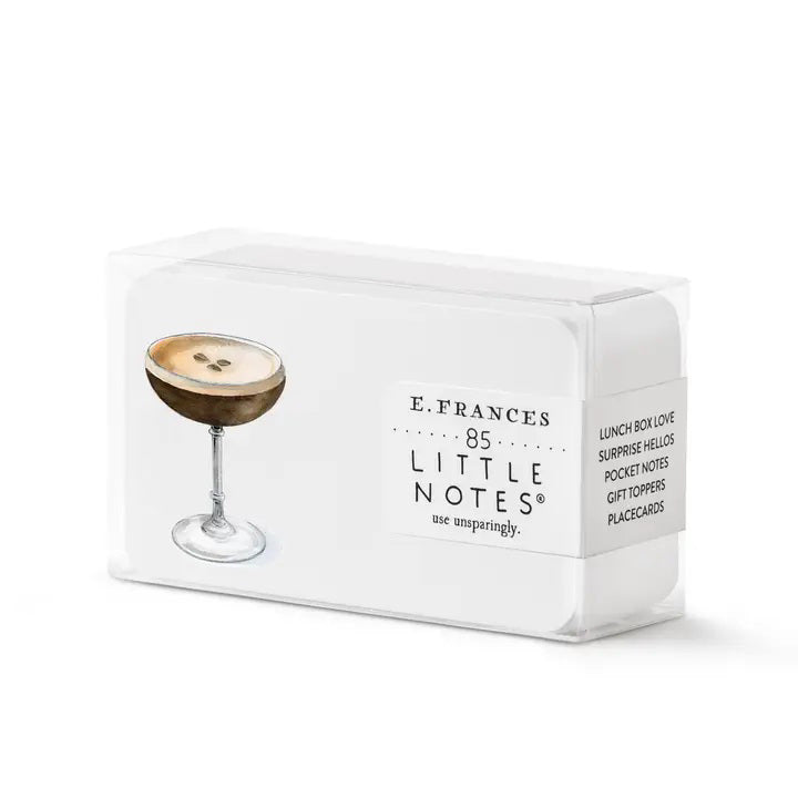 E. FRANCES - LITTLE NOTES ESPRESSO MARTINI by E. FRANCES PAPER: a stack of small notecards featuring an espresso martini illustration front and coffee beans back—perfect stationery for cocktail lovers—with a yellow pencil for scale.