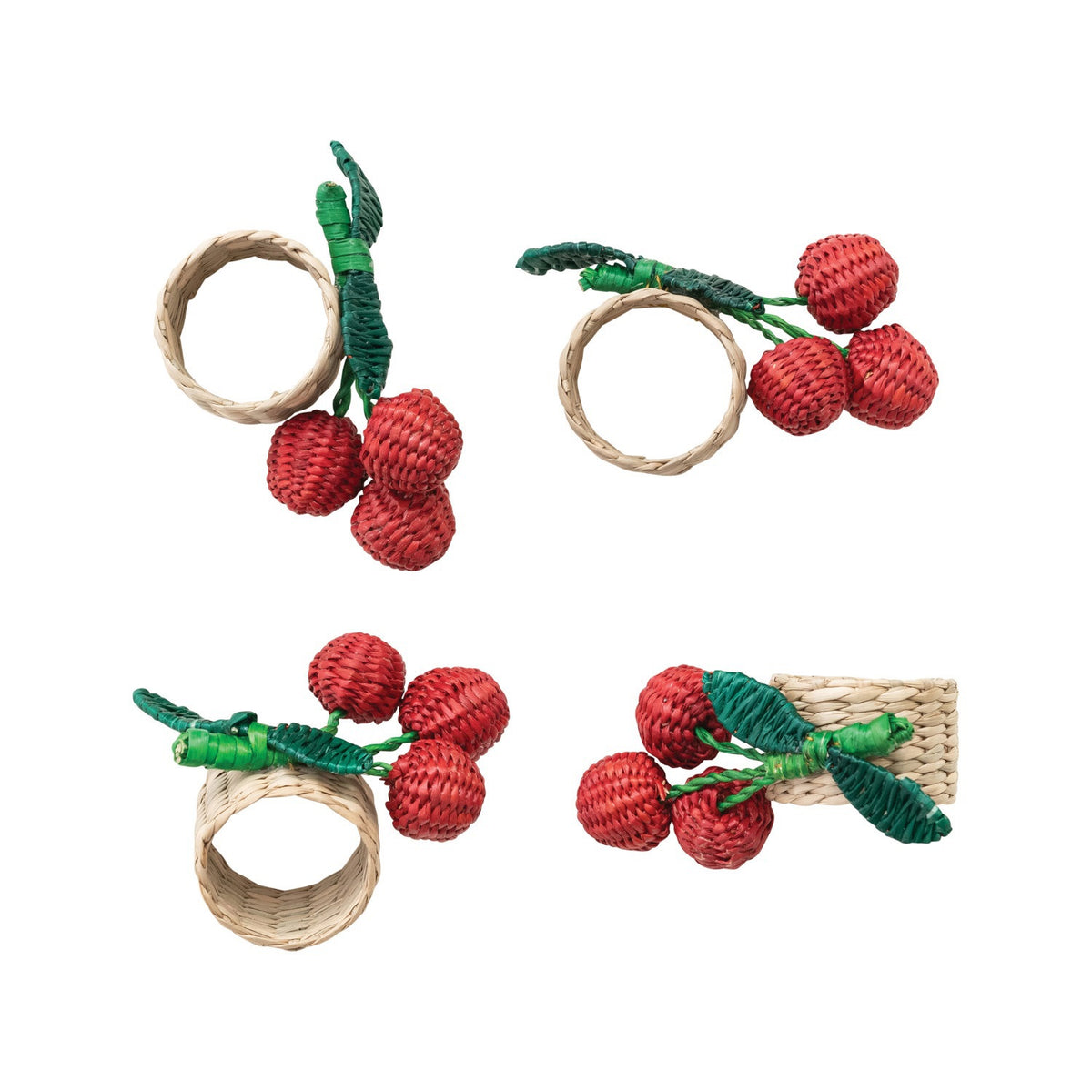 The CREATIVE COOP HAND-WOVEN SEAGRASS CHERRY NAPKIN RINGS, SET OF 4, feature clusters of red cherries and green leaves—ideal as handcrafted table decor and arranged beautifully on any setting.