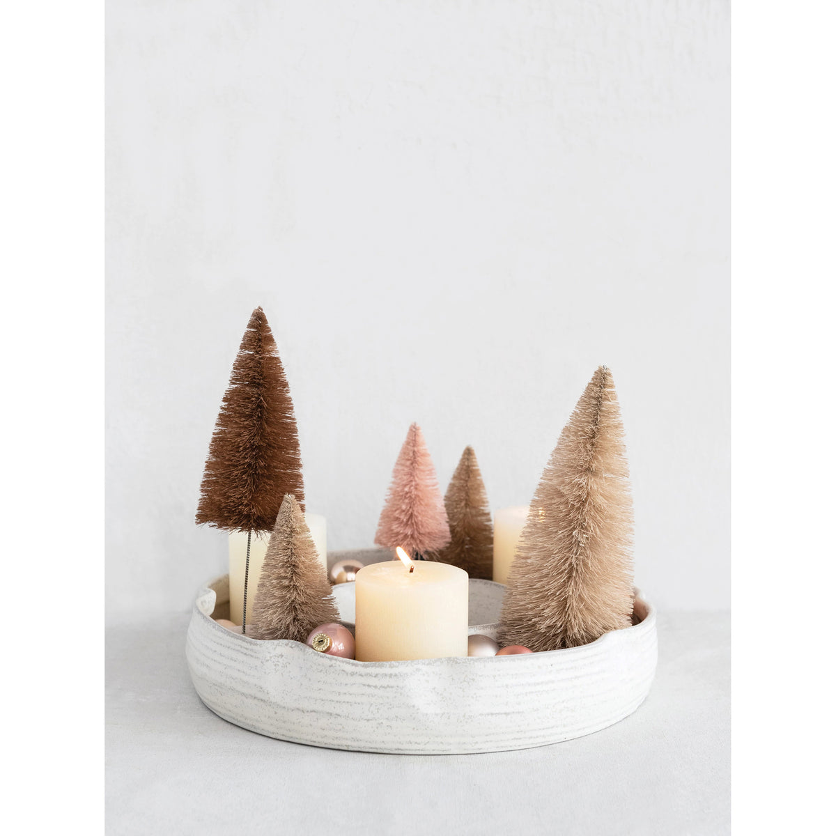 The CREATIVE COOP RING SERVING DISH is a white ceramic dish with a lid, made from 100% stoneware for lasting durability and timeless elegance.