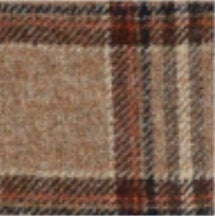 The WIGENS - Ivy Contemporary Tweed Cap in Beige Melange is a men’s flat cap crafted from brown plaid wool tweed, featuring a short sewn-down brim and a classic check pattern in shades of brown and beige with subtle hints of red and gray. Set against a plain white background, this stylish accessory is from the renowned brand WIGENS.