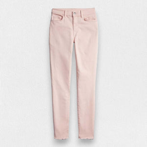 The FRANK & EILEEN SLIGO SKINNY JEAN is a pair of beige, high-waisted skinny jeans crafted from sustainable Italian Performance Denim. They feature a high-rise contour waistband, five pockets, button and zip closure, and a "Frank" label on the waistband. The jeans are displayed against a white textured background.
