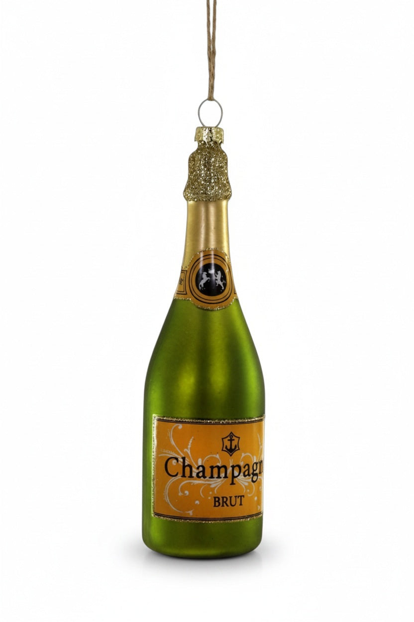 SPARKLING CHAMPAGNE ORNAMENT, a 6-inch glass ornament shaped like a green champagne bottle with a gold foil label and gold glitter top.