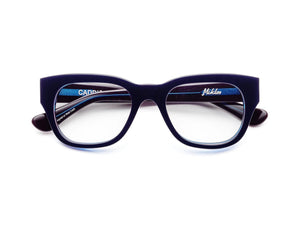 The CADDIS - MIKLOS PROGRESSIVE READERS by CADDIS, black thick-rimmed eyeglasses with durable scratch-resistant lenses, shown from the front against a white background.