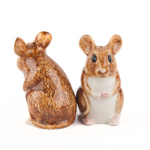 The QUAIL CERAMICS Wood Mouse Salt and Pepper Set by QUAIL DESIGNS features two hand-painted brown and white stoneware mice figurines with large ears, black eyes, and tiny paws, standing upright side by side.