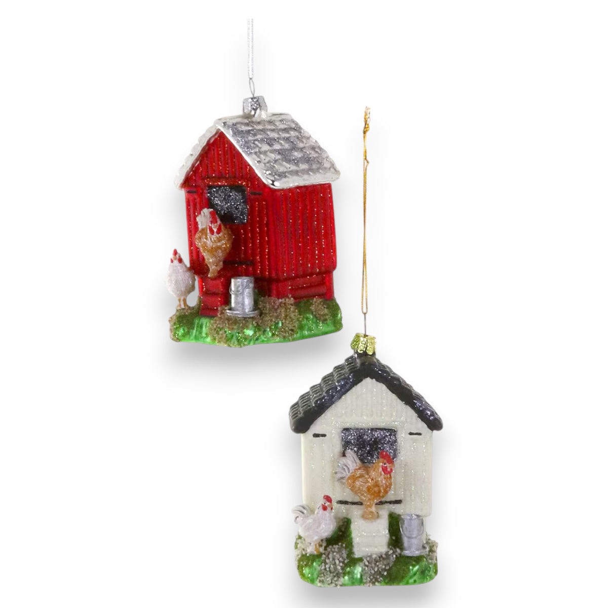 Ideal for design lovers or collectors, the CODY FOSTER CHICKEN COOP ORNAMENT set includes a red and a white ornament with charming chicken and rooster figurines on glittery grassy bases—perfect as unique gifts for any occasion.