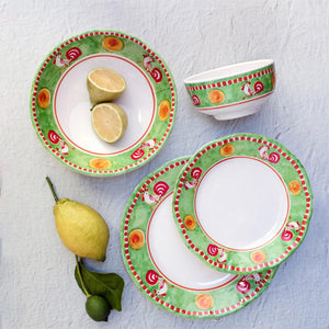 The VIETRI Melamine Campagna Pasta Bowl features a red interior with playful pig and fruit designs, a blue patterned edge, and a durable white melamine build—perfect for outdoor dining.