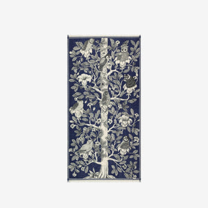 The INOUI EDITIONS - ARCHIMEDE WOOL SCARF IN NAVY by INOUI is crafted in India and features a detailed tree adorned with numerous birds and flowers on its branches, set against a white background.