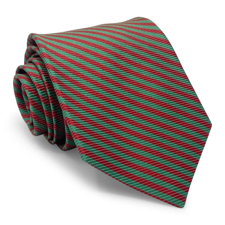 Here’s a revised version using your product data: A close-up of the PETER-BLAIR Thin Stripes Silk Tie in Dark Green and Red by BIRD DOG BAY, featuring evenly alternating diagonal stripes in deep green and red. Crafted from luxurious silk and finishing in a pointed tip, this handmade necktie boasts a festive, bold pattern.