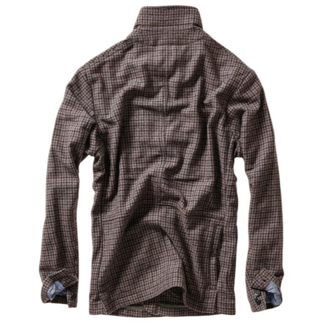 The RELWEN Heritage Trap Blazer in Brown and Blue Check features a brown and black plaid pattern, reminiscent of a classic check blazer, shown from the back with buttoned cuffs and a subtly wrinkled texture, laid flat on a white background.