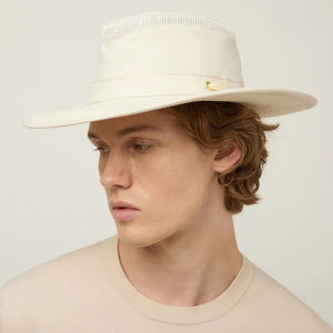 The TILLEY AIRFLO BROAD BRIM HAT LTM6 in Light Stone is a recycled nylon sun hat with UPF 50+ protection, wide brim, mesh ventilation near the crown, and a small band tag. Shown on a plain white background.