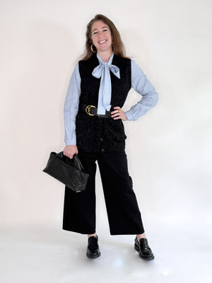 The SEVENTY VENEZIA - BLUE STRIPE SHIRT by SEVENTY features thin white vertical stripes, a chic bow tie collar, and an elegant high neck.