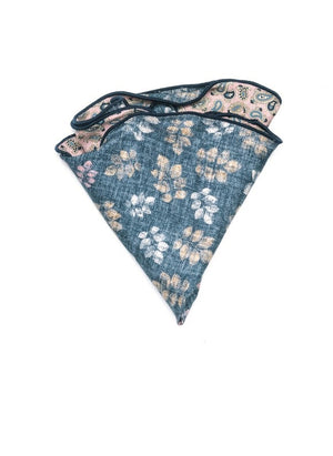 EDWARD ARMAH’s Edward Armrah - Reversible Silk Pocket Crcl in Pink Denim Leaf features a blue leaf pattern on one side and a pink print on the reverse, shown against a white background.
