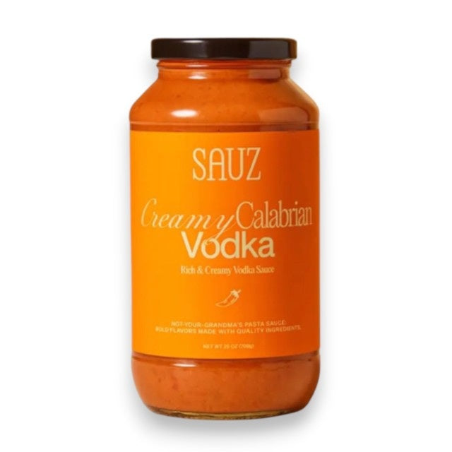 A jar of SAUZ CREAMY CALABRIAN VODKA SAUCE, a creamy, orange-colored pasta sauce.
