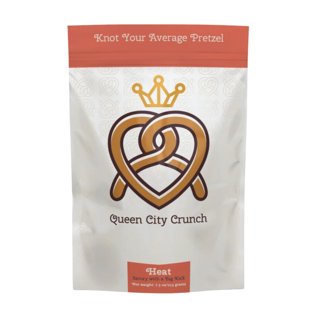 A white and red QUEEN CITY CRUNCH-THE HEAT bag by QUEEN CITY CRUNCH features a heart-shaped pretzel with a crown, the slogan &quot;Knot Your Average Pretzel,&quot; and offers the perfect spicy snack for those who crave heat.