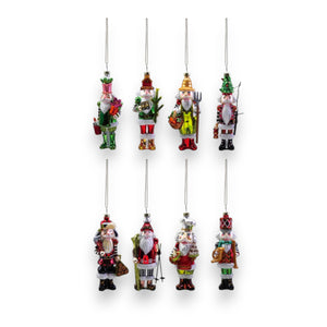 Eight GLASS NUTCRACKER ORNAMENTS by CREATIVE COOP hang in two rows on a white background, each featuring unique Christmas outfits and festive items for an assorted holiday display.