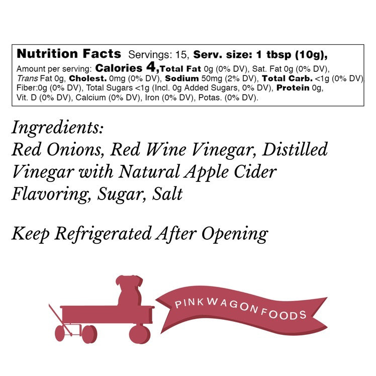 A clear jar with a white lid, labeled "PINK WAGON- PICKLED PINK ONIONS." The jar contains sliced Pacific Northwest onions in a pickling solution, filling the entire container. The label, branded with "PINK WAGON FOODS," features decorative red and white elements and indicates a net weight of 12 fl oz (355 ml).