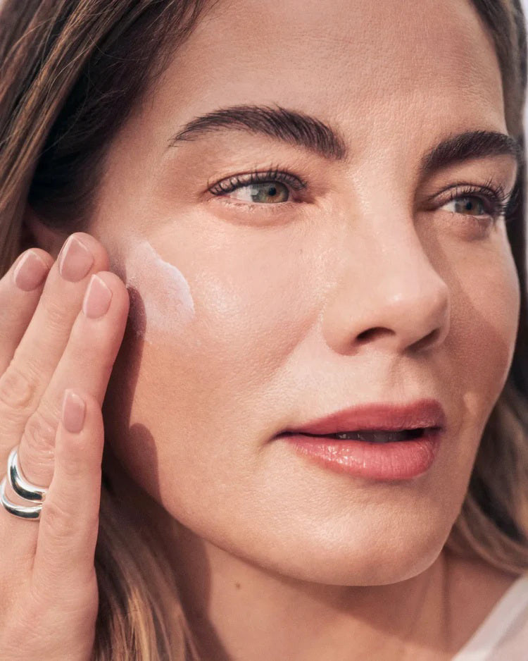 A white tube of U BEAUTY Multimodal Sheer Mineral Sunscreen stands upright against a plain background. This 50ml sunscreen offers broad spectrum SPF25 protection with Non-Nano Zinc Oxide.