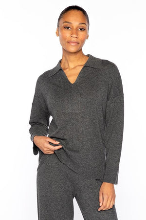 The KINROSS Cashmere Splitneck Polo in dark olive green features long sleeves, a wide collar, and a V-neckline, shown against a plain white background.