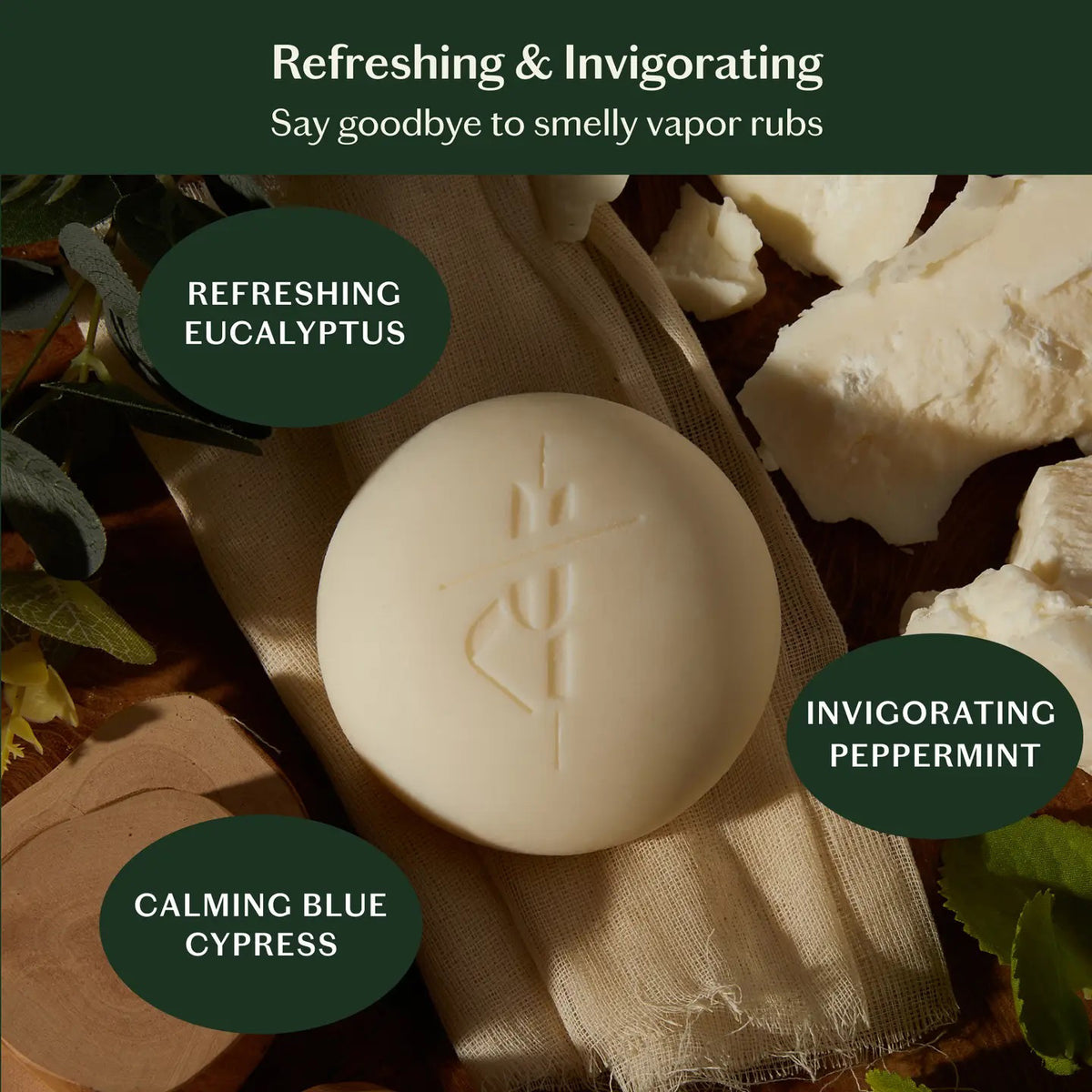 The KATE MCLEOD BREATHE STONE | SOOTHING CHEST RUB, a round white moisturizer stone with eucalyptus peppermint, is shown partially wrapped in cloth next to its green and orange box. A "LIMITED EDITION" red circle appears above on a pale yellow background.