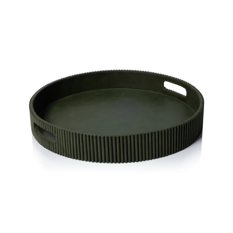 Close-up of the ZODAX ROUND FLUTED LEATHER TRAY IN GREEN, showcasing a smooth top and vertical, evenly spaced ridges on the sides for a modern, textured look.