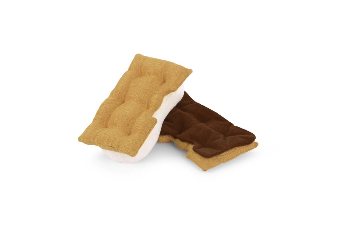 Sure! Here’s a rewritten sentence using your product data: Shaped like a s’more with light brown “graham crackers,” a white “marshmallow,” and a dark brown “chocolate” layer, this durable fabric dog toy—the CAMP CORBIN - GIMME S’MORE from PLAY PET LIFESTYLES—makes the perfect playtime or snuggle companion for pups.