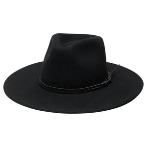 WYETH - RILEY WOOL RANCHER IN BLACK: a black wide-brim packable rancher hat with a matching black cord tied around the base of the crown.