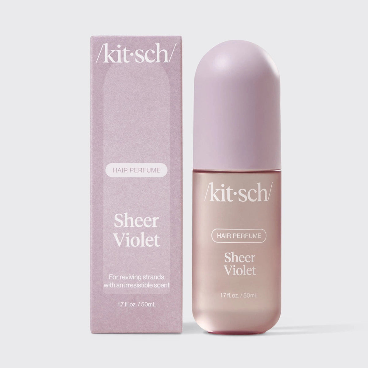 A 1.7 fl oz (50 ml) bottle of KITSCH - SHEER VIOLET HAIR PERFUME, featuring vegan, odor-eliminating technology, sits beside its matching light purple box with white text.