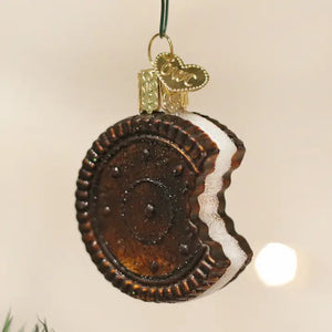 Old World Christmas SANDWICH COOKIE ORNAMENT shaped like a dark chocolate sandwich cookie with a creamy filling and a bite taken out of it.