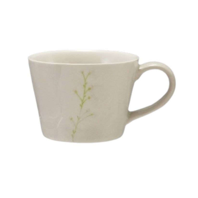 Four DEBOSSED STONEWARE MUGS WITH BOTANICAL PATTERN by CREATIVE COOP, featuring cream color, unique green botanical designs, and a subtle reactive glaze finish, are lined up side by side on a white background.