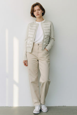 The SAVE THE DUCK BRIONY LIGHTWEIGHT PUFFER is a light gray, cropped, long-sleeve quilted jacket with padded front, ribbed cuffs and hem, two front pockets, and zip closure—ideal for summer layering. Displayed on a white background.
