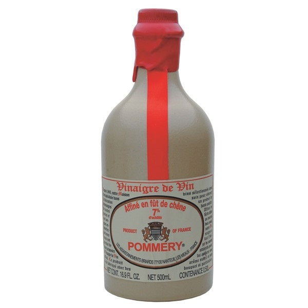 A 16oz stoneware bottle of THE FRENCH FARM POMMERY RED WINE VINEGAR, featuring a red wax seal and ribbon, labeled in French—an elegant vessel that adds timeless charm to any kitchen.