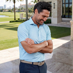 COLLARS AND CO - Featherweight Flex Polo in Middleton Sage with navy stripes, featuring a dress collar, three-button placket, and 6-way stretch fabric for comfort. Displayed on a plain white background.